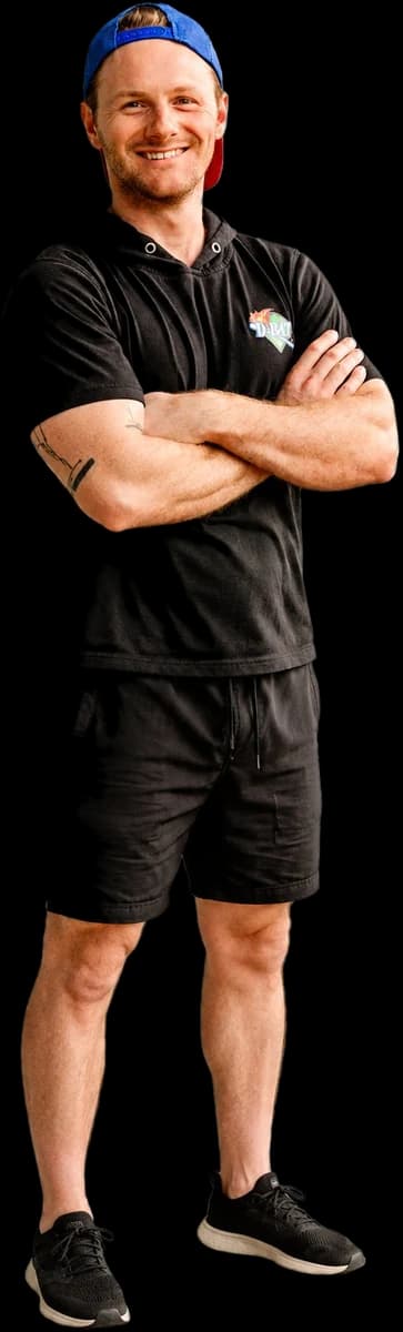 Kyle Niemeier, arms crossed, smiling